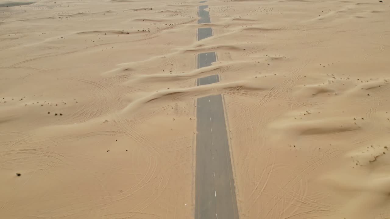 Desert Road Through Sand Dunes