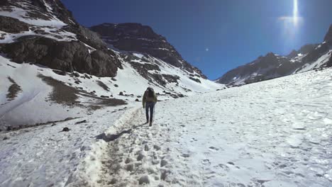 hiking through mountain snow