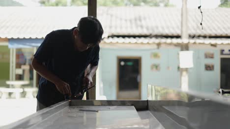 man welding metal