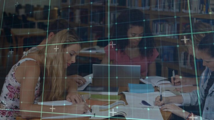 Writing group of students studying with laptop, textbooks at library, translucent grid