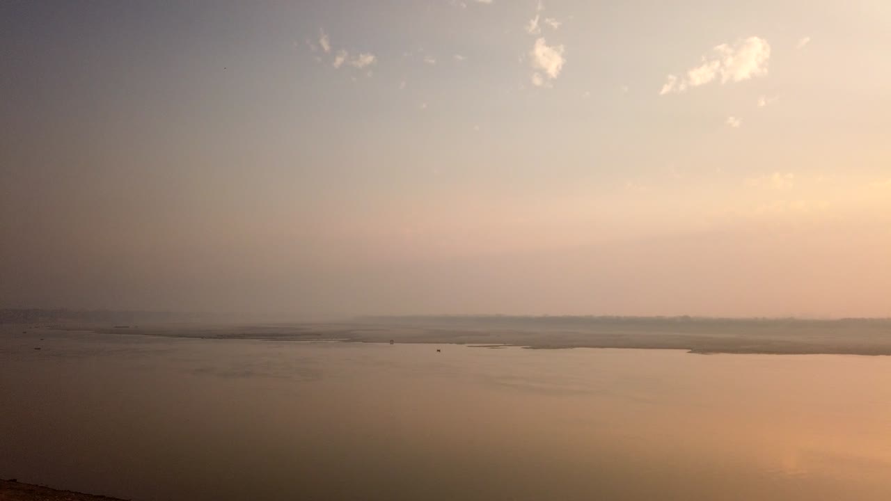 Gorgeous Tracking Timelapse of the River Ganges and Sacred Ghats at Varanasi, Benares, Banaras, Kashi, Uttar Pradesh, Lucknow, India.
