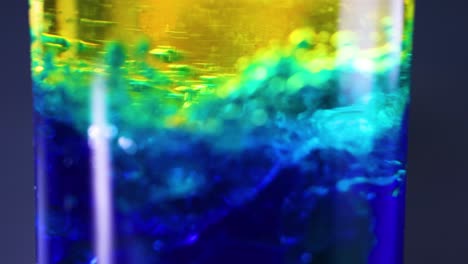 vibrant liquids interacting in a laboratory setting