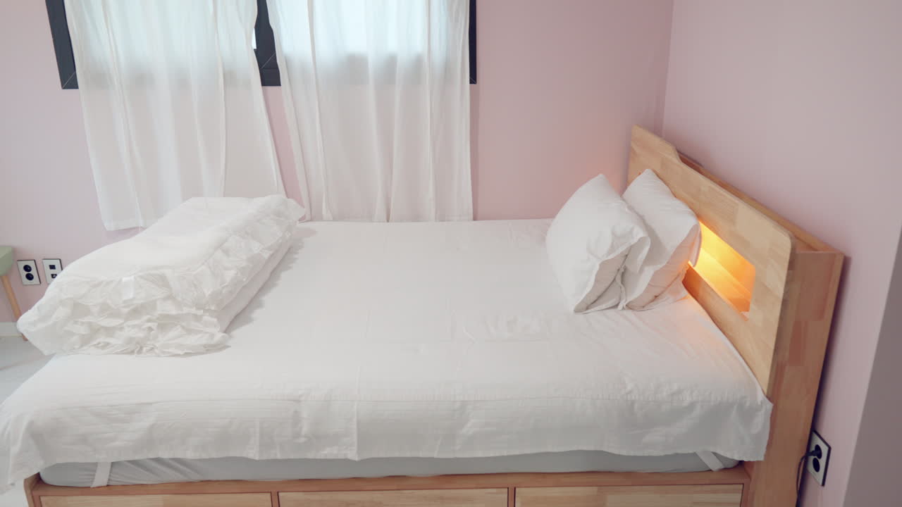 Stylish Scandinavian Children's Room Interior with Wooden Bed and Pink Walls