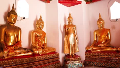 buddha statues in wat pho, bangkok, thailand