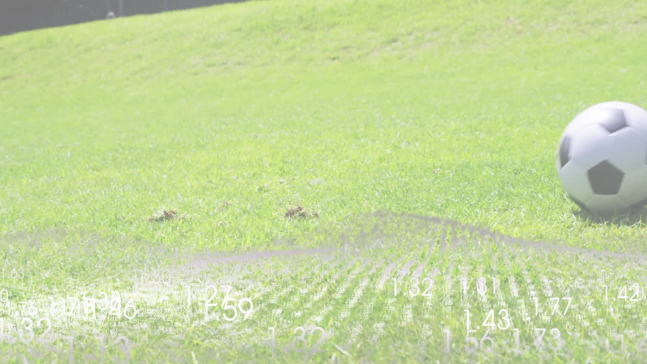 After ball rolls soccer player sliding tackle intercepting with floating arrow for sports analytics