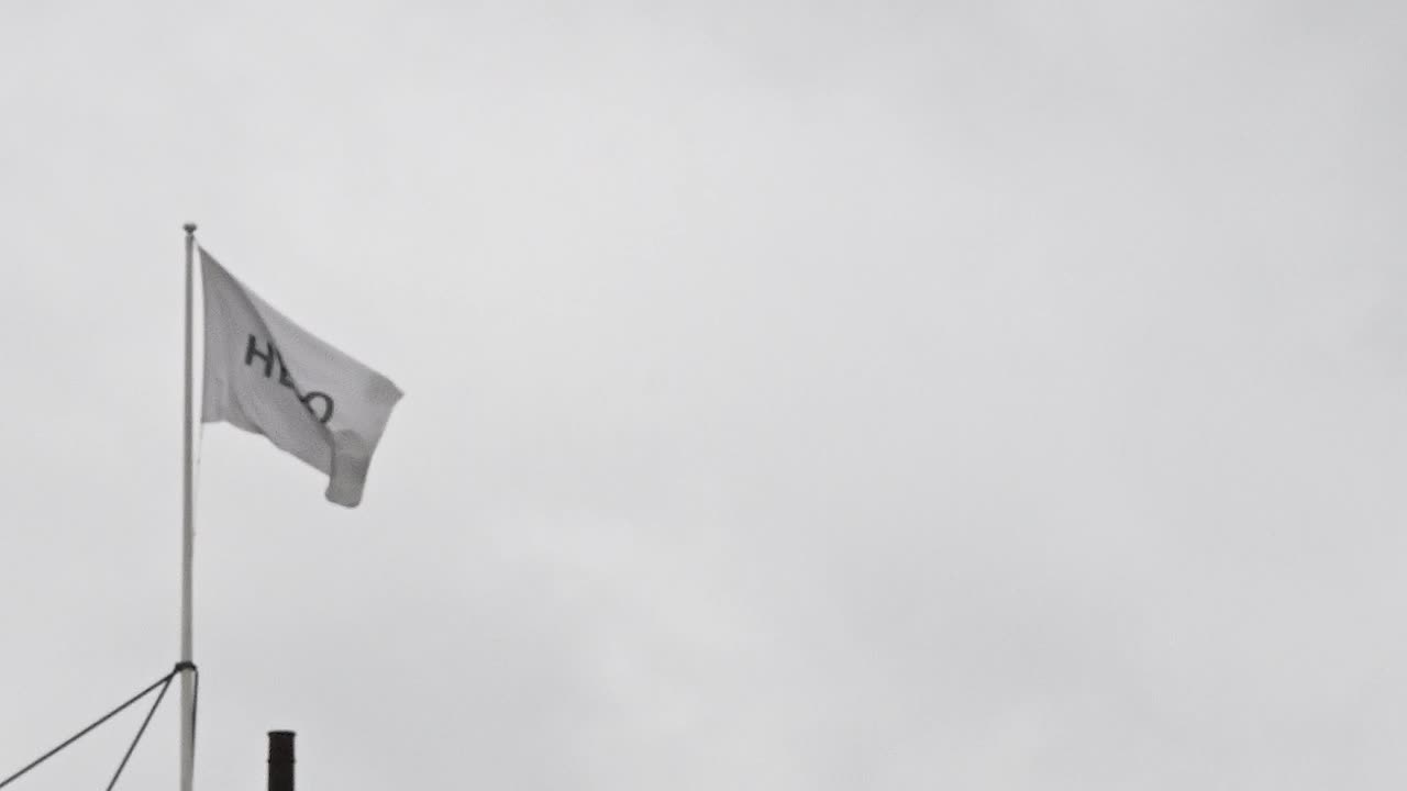 una bandera que dice "hola, londres, reino unido"