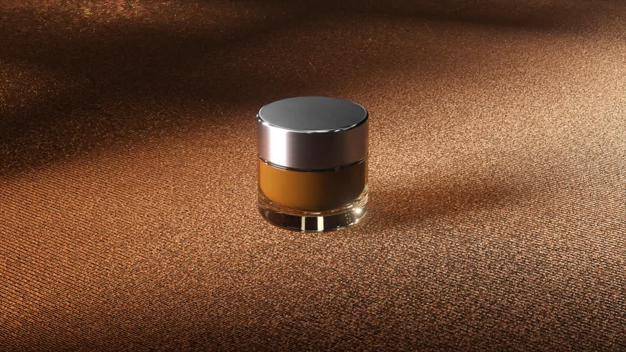 파란색 직물 배경에 고급 금 화장품 항아리