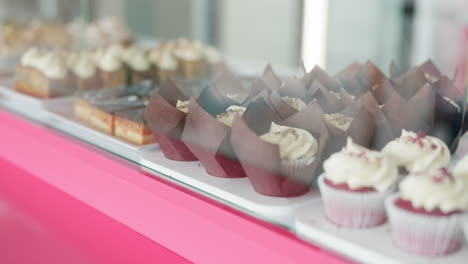 Bakery,-donuts-and-display-of-cake-in-cafe-to