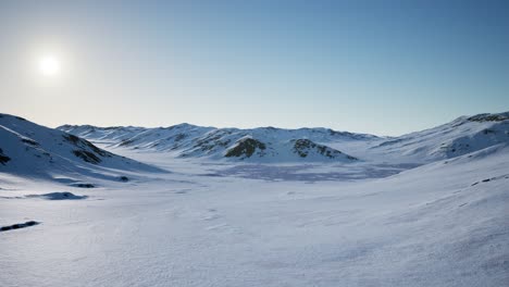 Aerial-Landscape-of-snowy-mountains-and-icy-shores-in-Antarctica