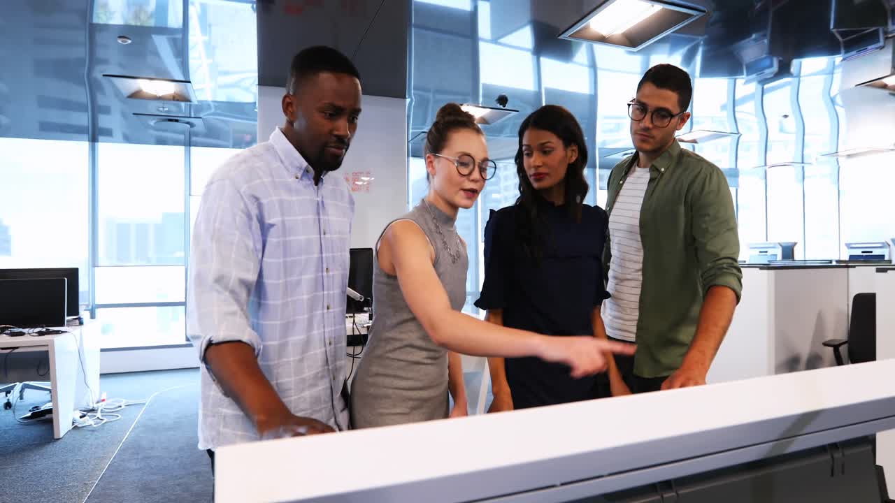 Business colleagues using invisible screen in conference room 4k