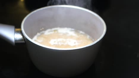 cooking rice in a saucepan
