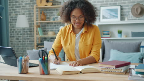 young woman studying at home