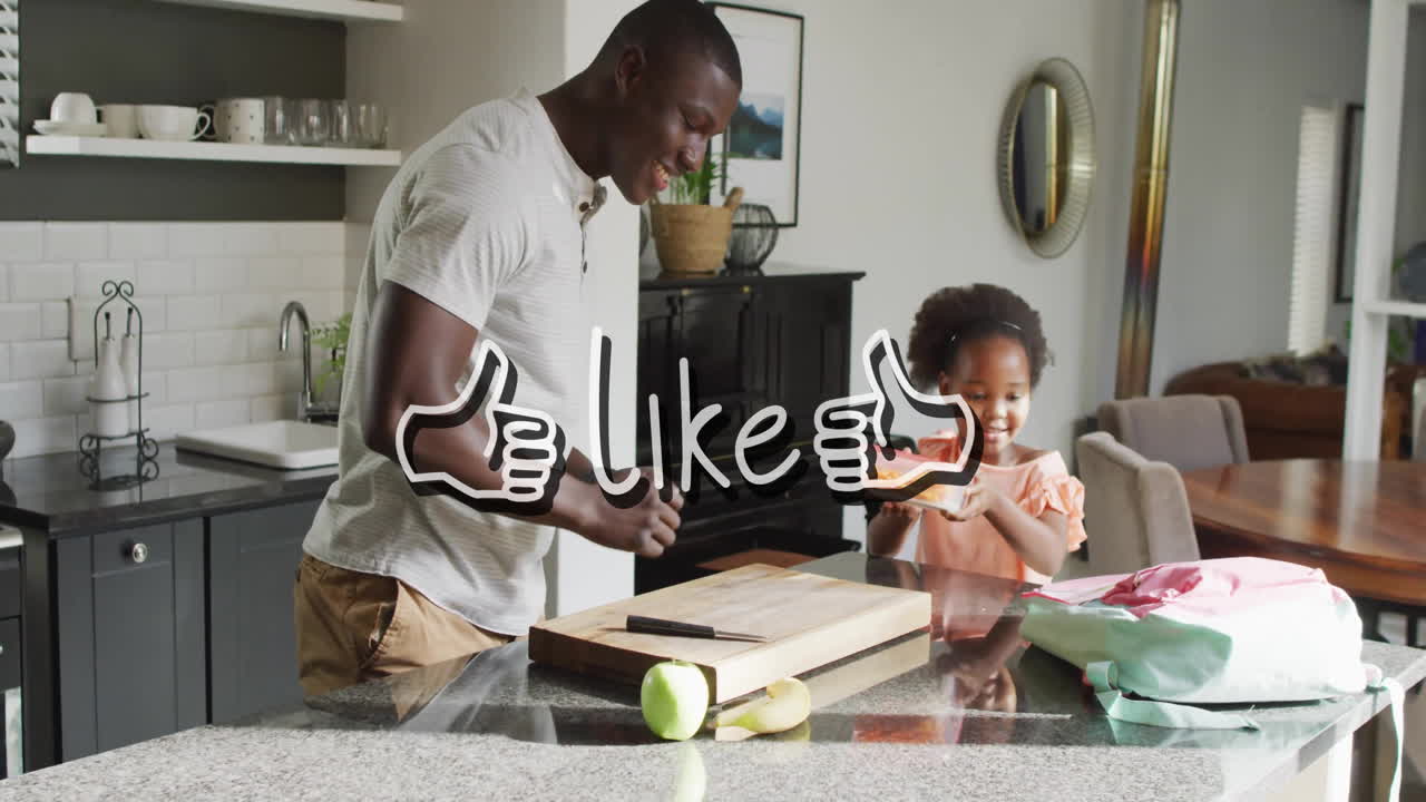 Preparing food in kitchen, father and daughter with thumbs up and text animation