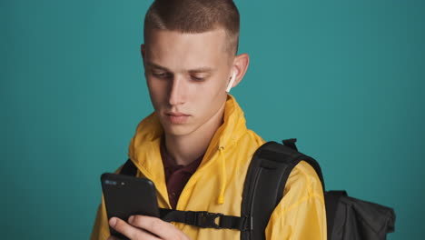 Traveler-boy-with-backpack-chatting