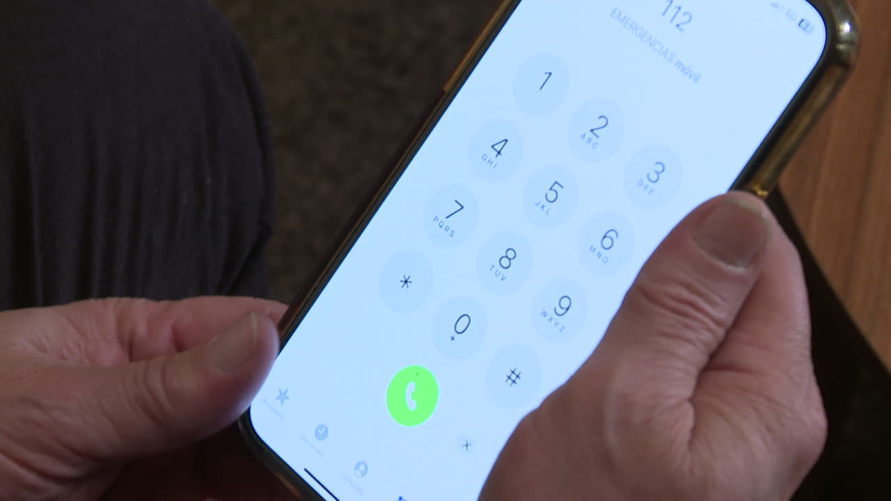 Person making a phone call on a smartphone