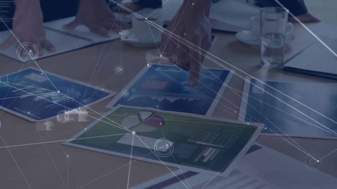 Animation of connections over hands of diverse designers working