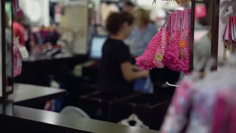 Work-of-the-cashier-in-the-supermarket-of-clothes-3