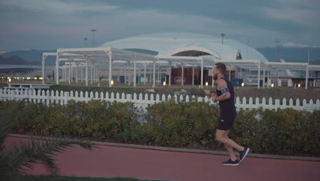 man running at the airport park