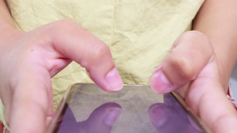 a close-up view of hands interacting with a smartphone showcasing modern digital engagement