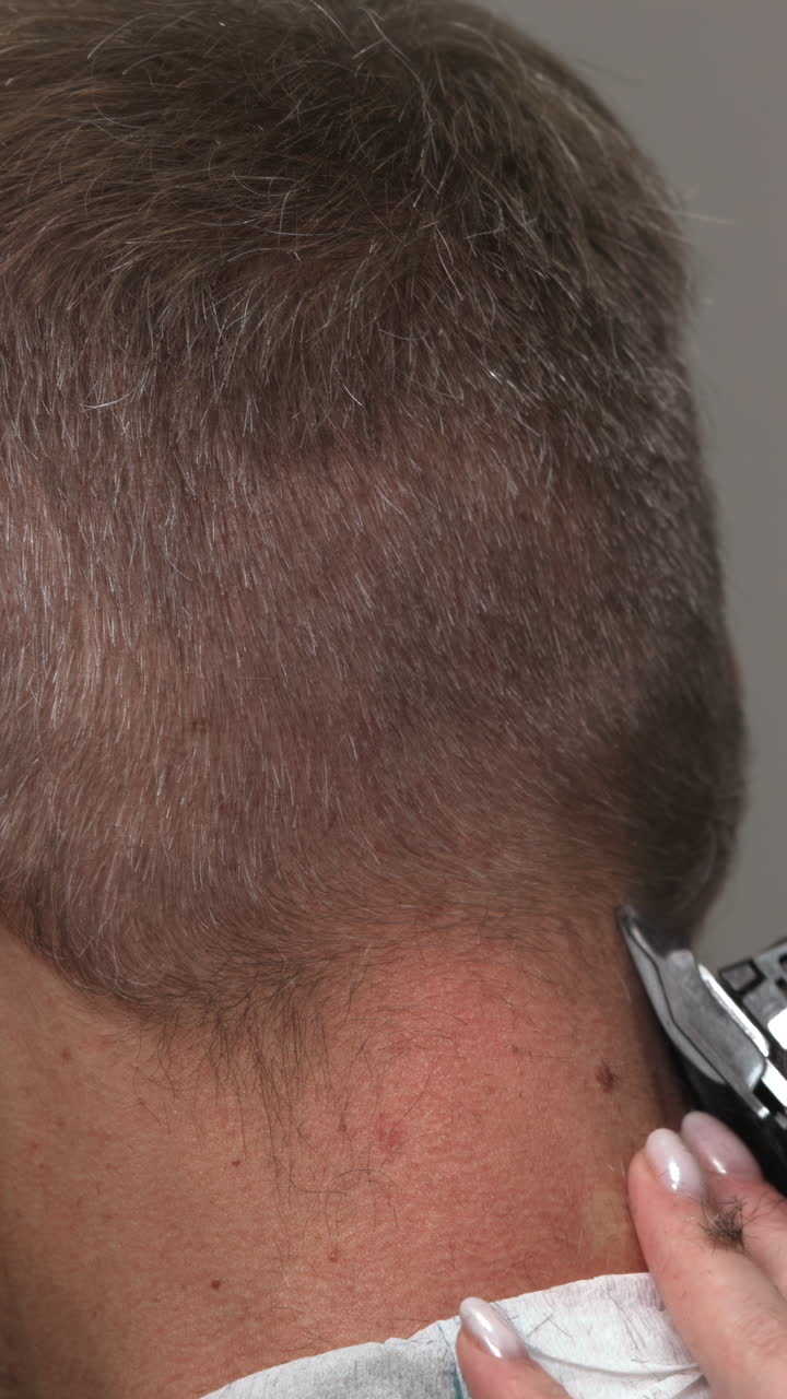 Professional Haircut Using Electric Clippers on Nape