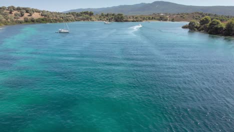 High-speed-drone-video-over-boats-yacht-blue-clear-sea-water-summer-sunny