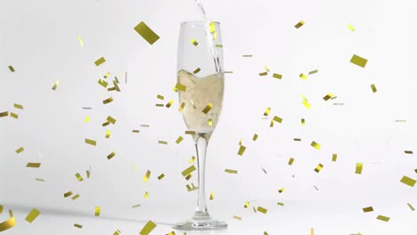 Animation-of-gold-confetti-falling-over-glass-of-champagne-on-white-background