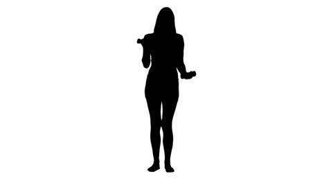 silhouette of an energetic woman exercising