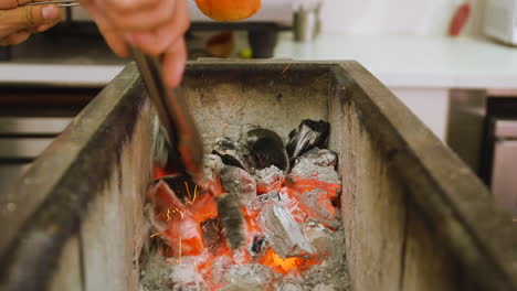 Mexican-cook-preparing-mango-in-kitchen