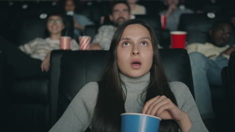 surprised teenager at the movies
