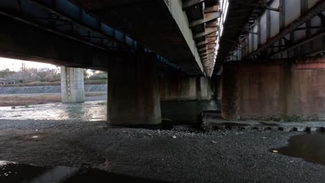 time-lapse of a river under a bridge.