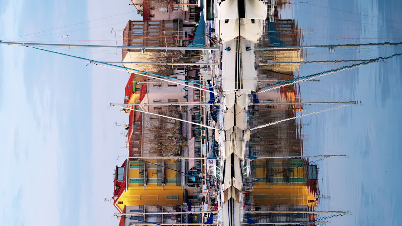 Boats docked in the Port de Golfe-Juan in the evening. Vertical