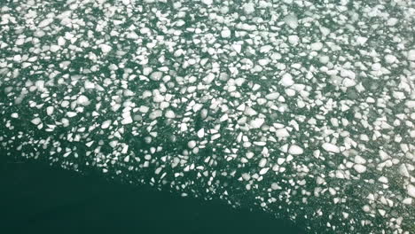 cinematic rising angle drone shot of sea ice near the selfoss area in iceland