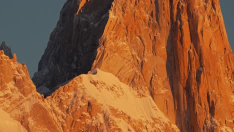 golden light bathes the rugged peaks of fitz roy in patagonia at sunset