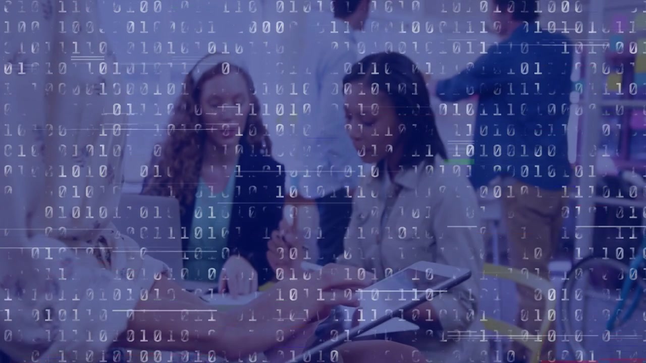 Left man leaning in handing device, two women tapping tablet, reviewing docs under binary overlay