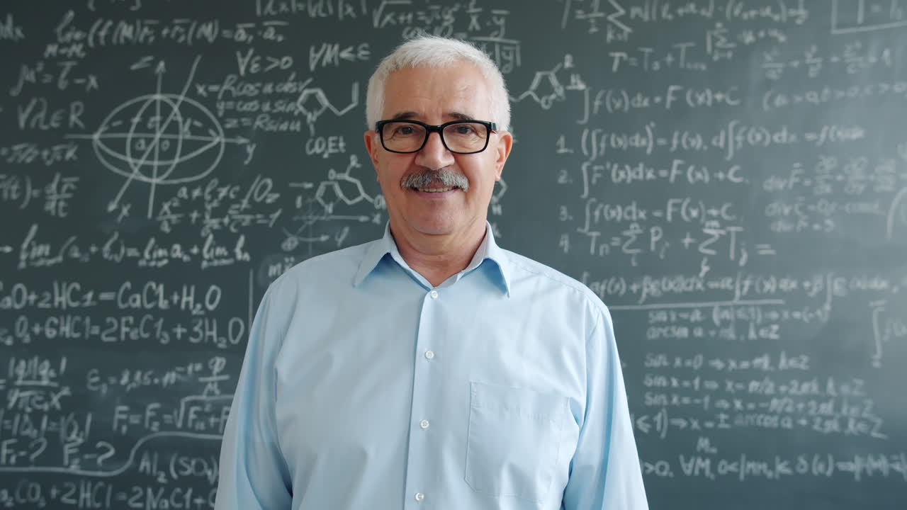 Smiling Professor in Front of a Chalkboard Full of Equations