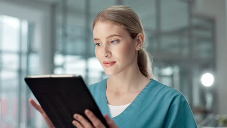 healthcare professional using a tablet