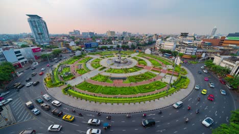 time lapse of wongwian yai roundabout. aerial view of highway junctions. roads shape circle in structure of architecture and technology transportation concept. top view. urban city, bangkok, thailand.