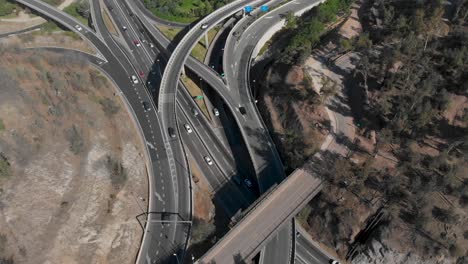Aerial-Static-shot-of-Highway-Overpass-with-Traffic-on-a-Sunny-day-in-Santiago-de-Chile,-4K