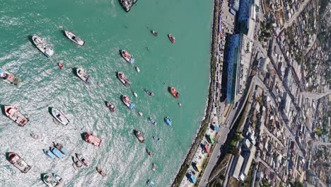 aerial high angle view of moored fishing boats in port of san antonio in chile