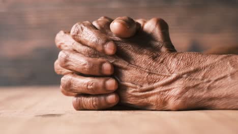 elderly hands in prayer