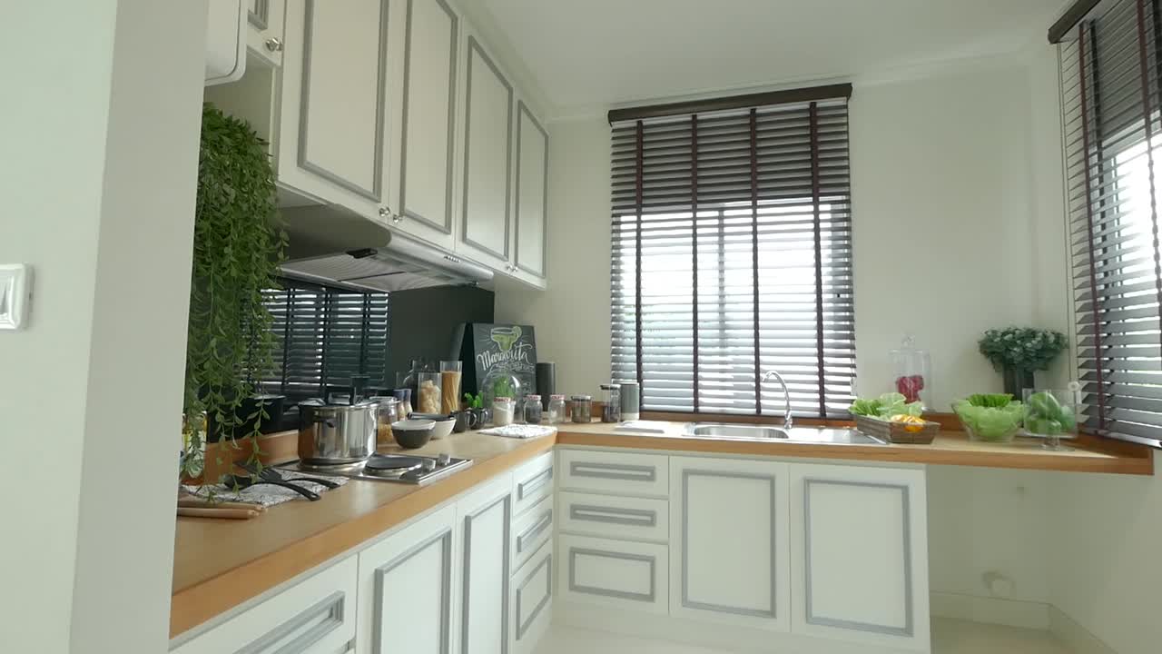 idea de decoración de área de cocina-despensa compacta y moderna