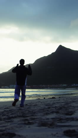 man running on the beach