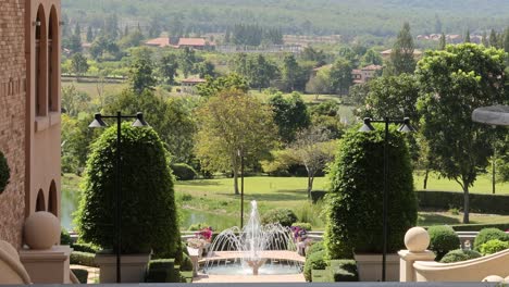 scenic view of a lush garden from a luxurious balcony