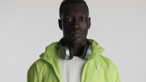 serious african american man on grey background.