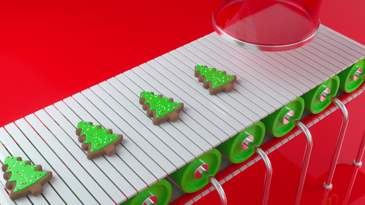 크리스마스 트리 모양의 크리스마스 쿠키가 컨베이어를 따라 움직입니다. 북극에 있는 산타의 크리스마스의 장난감 공장. 크리스마스 선물과 함께 컨베이어 벨트.