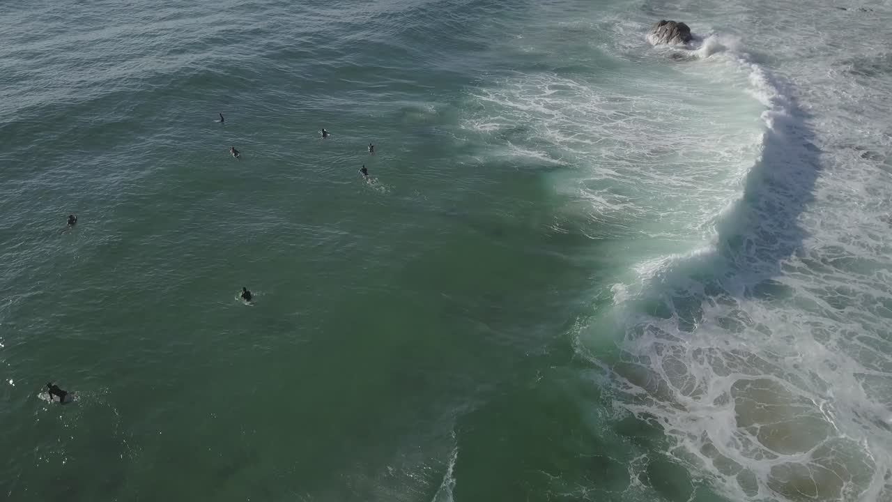 Aerial view of Guincho spot on a sunny day with blue sea, Cascais Portugal