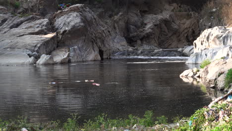 the dirty and polluted water in the bagmati river in nepal