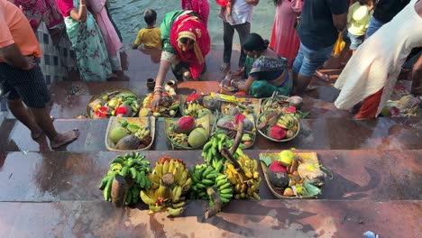 chath prasad to be offered to lord sun kept near ghat during chath puja in kolkata. india.