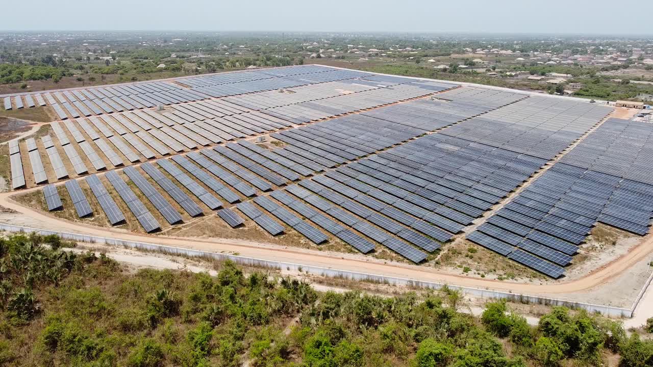 Aerial high drone overview of completed construction of Solar PV farm power plant