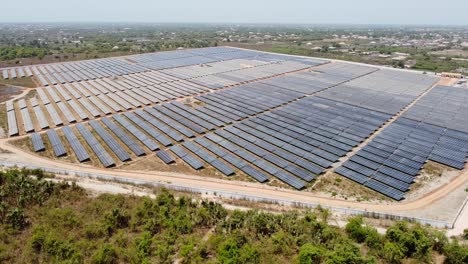 aerial high drone overview of completed construction of solar pv farm power plant